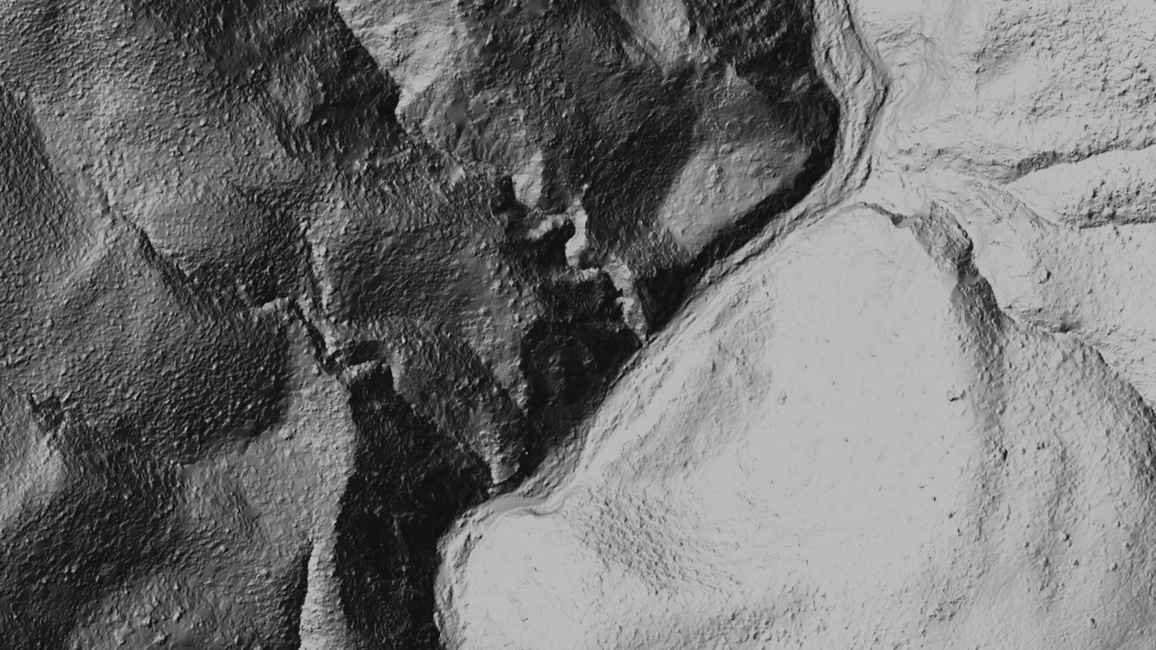 Shaded relief from drone LiDAR over steep, dissected canyons, bare earth under the brush.