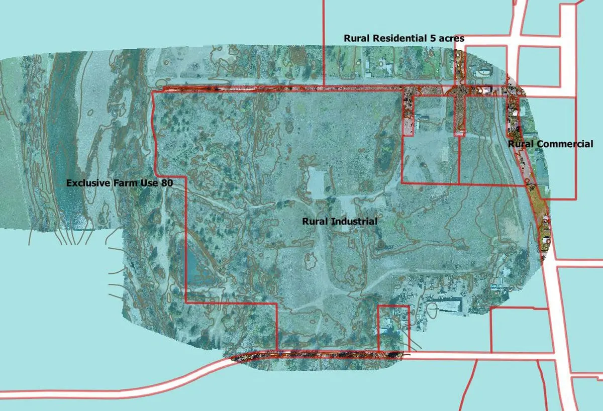 Contours drawn over the orthomosaic of a parcel along Highway 199.